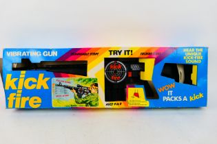 Louis Marx - A boxed Marx Toys Kick Fire Vibrating Gun - The #3360 gun appears in very good