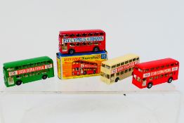 Matchbox - A boxed Daimler Bus # 74 and 3 x unboxed models in red, cream and green.