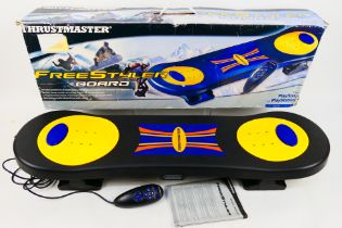 Thrustmaster - A boxed Thrustmaster Freestyler Board for use with PlayStation and PlayStation 2.