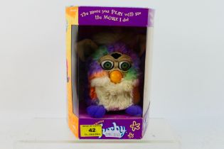 Furby - A boxed Furby #70-800 Patent Pending doll - Furby comes with instruction manual and Furbish