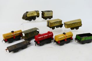 Chad Valley - An unboxed group of Chad Valley O gauge railway items including a 0-4-0 clockwork