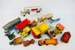 Dinky Toys - An unboxed collection of playworn diecast commercial vehicles form Dinky Toys.