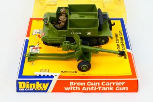Dinky Toys - A boxed Dinky Toys #619 Bren Gun Carrier with Anti-Tank Gun.