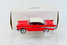 Franklin Mint - Precision Models. A boxed 1957 Chevrolet Belair, appearing in Excellent condition.