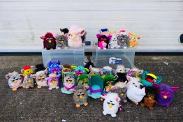 Hasbro - Tiger Electronics - A unboxed collection of over 30 Furbys.