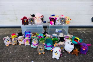 Hasbro - Tiger Electronics - A unboxed collection of over 30 Furbys.