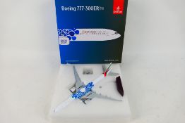 Gemini Jets - A boxed Emirates Store Boeing 777-300ER in Expo 2020 Dubai UAE livery in 1:200 scale.