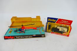 Dinky Toys - Two boxed Dinky Toys police vehicles.