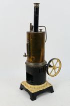 Doll & Co - An unboxed vertical steam engine by Doll & Co (Nuremburg).