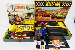 Scalextric - A boxed Scalextric Set 50 with a boxed Scalextric Set Extension Pack HP1.