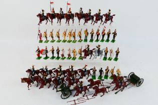 Britains - A collection of figures including soldiers on horseback, a gun carriage set,