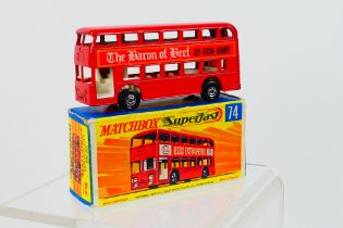 Matchbox - A boxed Daimler Bus #74 in the rare The Barron Of Beef livery,