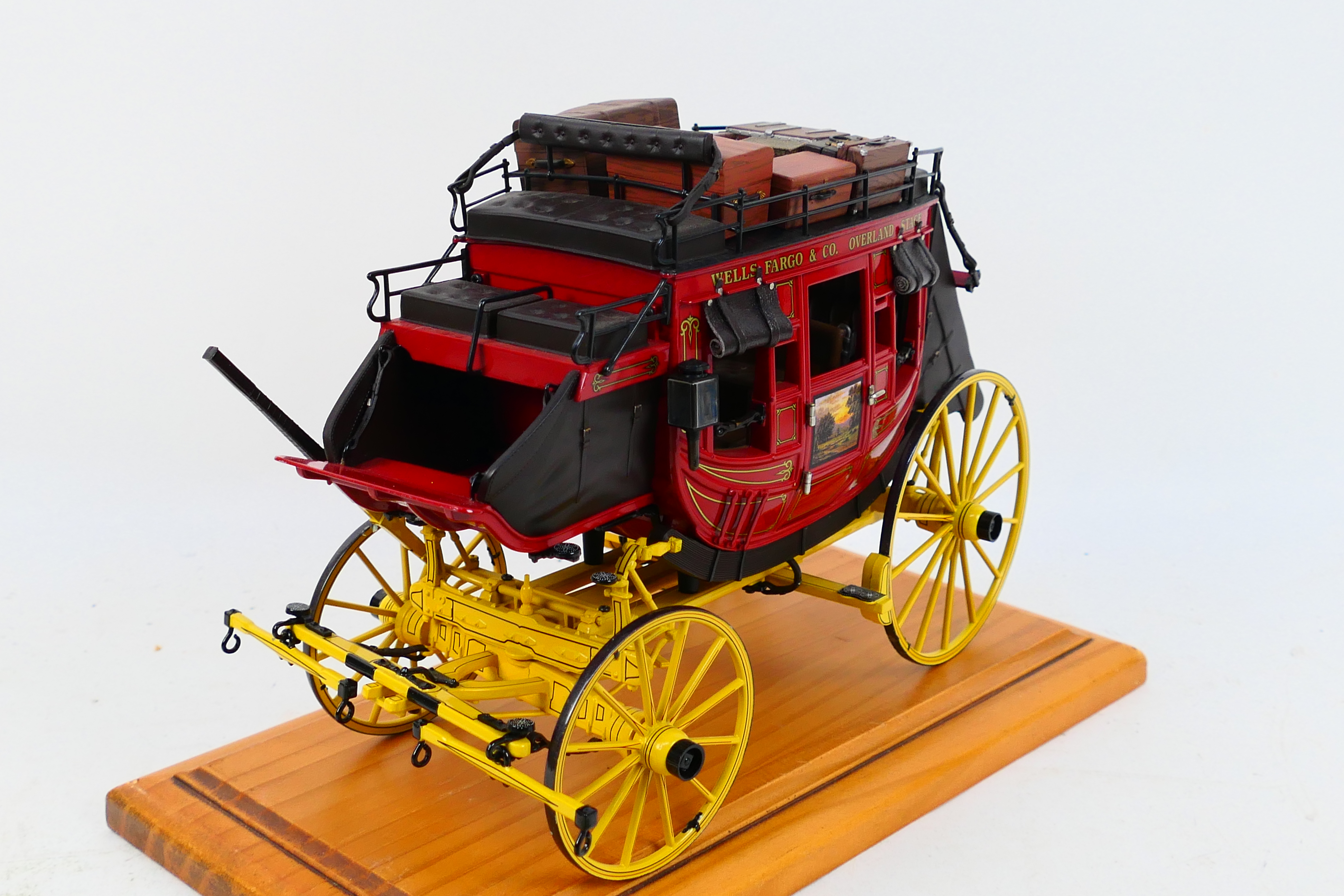 Franklin Mint - A Franklin Mint 1:16 scale Wells Fargo Overland Stagecoach. - Image 4 of 9