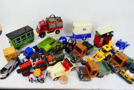 Dickie Toy - A collection of unboxed plastic vehicles in various scales.