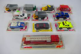 Majorette - A group of 11 x bubble packed models including Mercedes Benz 190E, Toyota Hi Lux,
