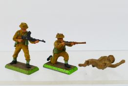 Britains Deetail - An interesting lot that contains three Britains Deetail British Infantry Man.