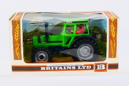 Britains - A boxed Britains diecast #9526 Deutz DX110 Tractor.