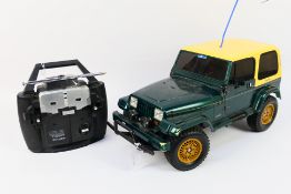 Tamiya - An unboxed and unmarked 1:10 scale radio controlled battery powered Jeep Wrangler