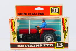 Britains - A boxed Britains diecast #9520 Massey Ferguson Tractor.