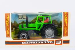 Britains - A boxed Britains diecast #9526 Deutz DX110 Tractor.