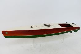 Kellner - A vintage Keller wooden clockwork speedboat.