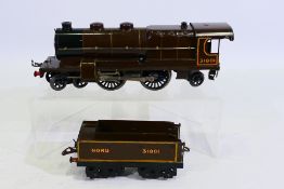 Hornby - An unboxed Hornby #3c 4-4-2 clockwork locomotive and tender Op.31801 in Nord brown livery.
