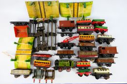 Hornby - A quantity of unboxed mainly Hornby O gauge rolling stock,
