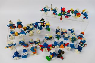 Peyo - Schleich - An unboxed collection of vintage Peyo / Schleich Smurf figures,