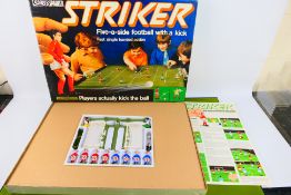 Striker - Football with a kick - Parker.