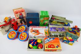 Chinese Made - Other -A mixed group of predominately boxed modern Chinese made tinplate toys,