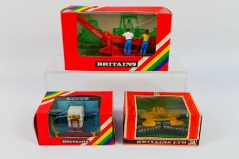 Britains - Three boxed Britains farm implements.