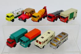 Matchbox - A group of vehicles including Leyland pipe truck # 10, Bedford TK petrol tanker # 25,