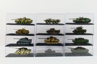 Atlas - 12 x boxed Atlas Military vehicles - Lot includes a Leopard 2 A5 Kosovo 2000.