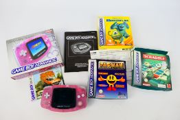 Nintendo - A boxed Game Boy Advance 32 bit with 3 x boxed games Monsters Inc, Pac-Man and Scrabble.