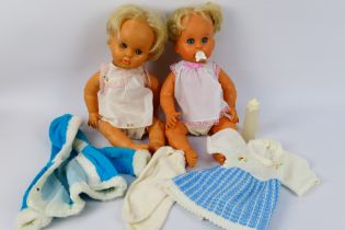Pedigree - Two unmarked vintage 'First Love' dolls.
