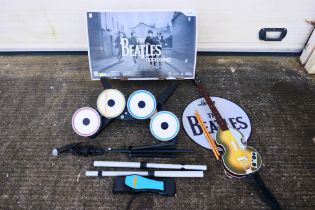 Nintendo - Wii - A boxed Nintendo Wii The Beatles Rockband game set - Lot includes drum kit, guitar,