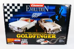 Carrera - A boxed Carrera Evolution James Bond 007 Goldfinger slot car set - The 1:32 #25330 set