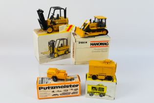 NZG - Conrad - 4 x construction models in 1:50 and 1:25 scales, a Hanomag D 680 E crawler dozer,