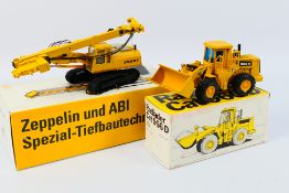 NZG - Conrad - 2 x boxed construction vehicles in 1:50 scale,