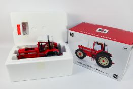 Universal Hobbies - A boxed limited edition 1983 International 1455XL tractor in 1:16 scale #
