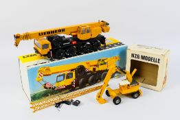 NZG - Conrad - 2 x boxed construction vehicles in 1:50 scale,