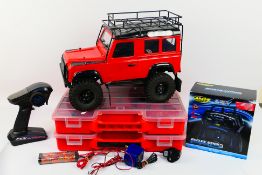 FTX- An unboxed fully working radio controlled Land Rover Defender FTX Outback Ranger model which