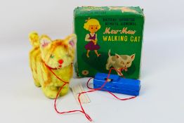 Trade Mark Modern Toys - A boxed batter operated Mew-Mew Walking Cat made in Japan - Model appears