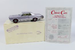 Danbury Mint - Classic Cars - A 1:24 scale 1965 Pontiac GTO die-cast model by Danbury Mint - Model