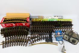 Lehmann - Faller - Others - A boxed set of 12 unused LGB #1100 brass curved G gauge track pieces in
