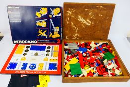 Lego, Meccano - A lot including various Lego pieces to include wheels, some vehicles, and similar.