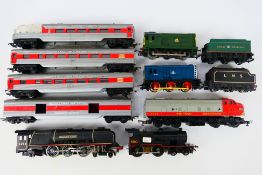 Wrenn - Triang - Hornby - A group of unboxed OO gauge locomotives with some passenger coaches.