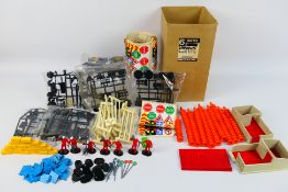 Britains - An unboxed mixed collection of Britains parts, unfinished parts and decals.