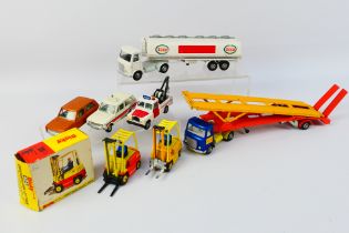 Dinky - A group of vehicles including an AEC car transporter # 974,