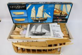 Billings Boats - A partially constructed wooden 1:25 scale Billings Boats #802 'La Curieuse' model